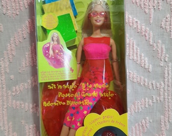Barbie sur son siège - Jeux & Jouets