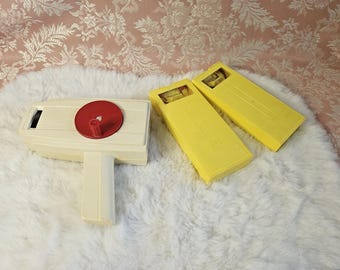Reproductor/visor de películas Fisher Price vintage de los años 70, funcionando con 2 casetes.