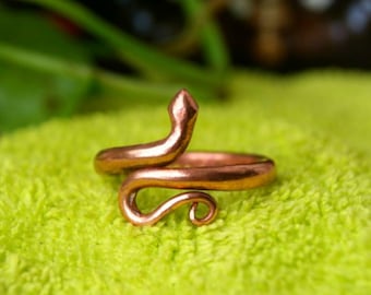 Anillo de serpiente envolvente, ajustable, de cobre, unisex.