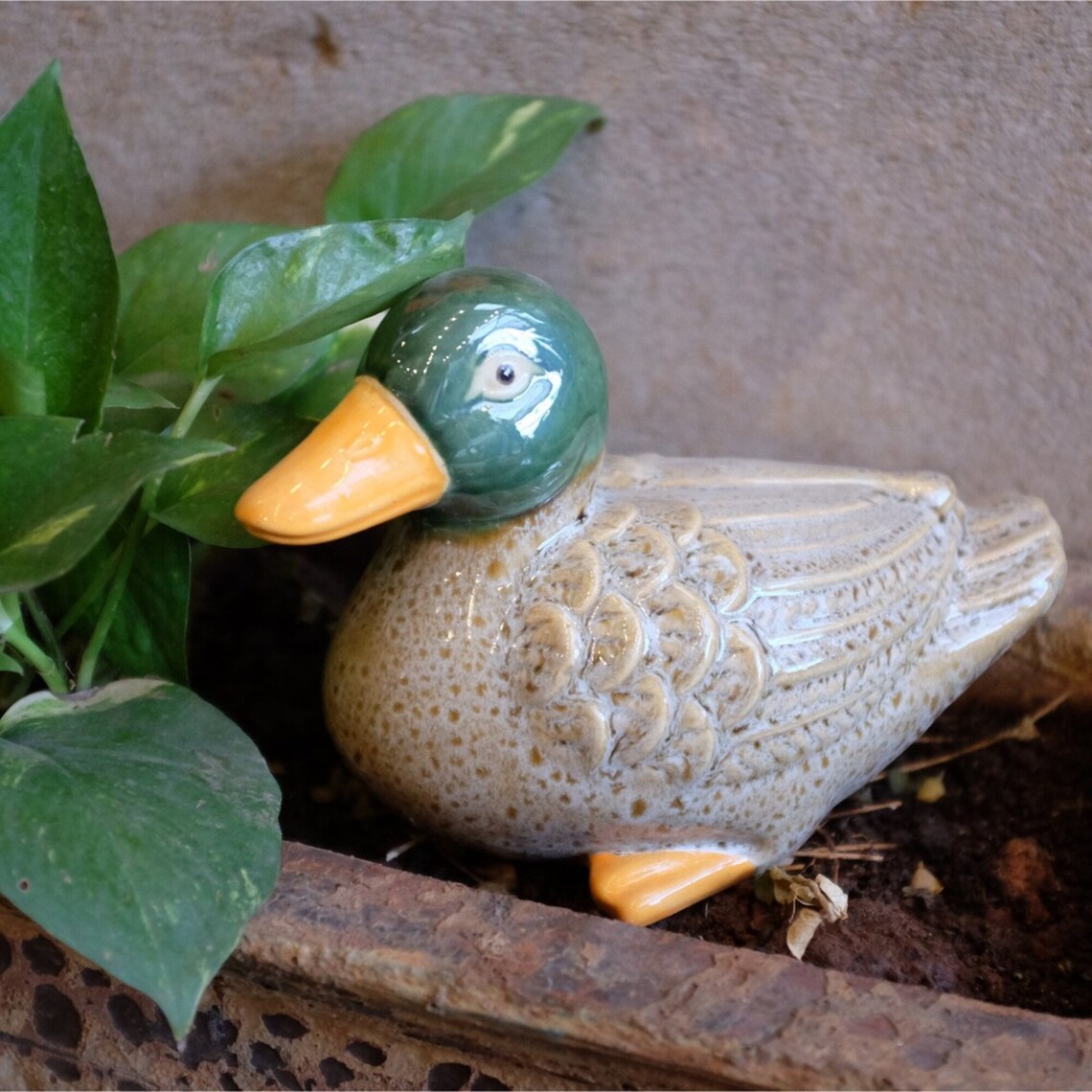 ceramic duck statue