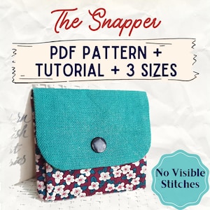 May include: A teal fabric wallet with a floral patterned base and a black snap closure. The text "The Snapper" is at the top, with "PDF PATTERN + TUTORIAL + 3 SIZES" below. A teal badge reads "No Visible Stitches".