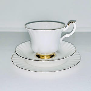 Royal Albert - Val D’or, tea trio (cup, saucer and plate set)