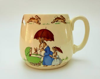 Royal Doulton - Bunnykins, Family w Pram & Leap Frog Mug. Signed Barbara Vernon