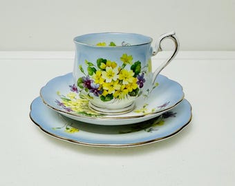 Royal Albert - Primulette, tea trio with blue harlequin background