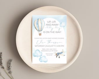 May include: A blue and white hot air balloon with a blue airplane and clouds on a light blue background. The text reads "Up, Up, And Away baby boy is on the way!"  Please join us for a baby shower honoring Else Thompson. Saturday, August 11, 4:00 PM. 78934 Long Lane Drive, Meadowville WY 34567. RSVP to Anna 555-555-1234.