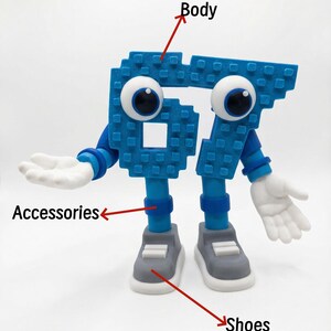 May include: A blue number 67 figure with large googly eyes, white hands, and gray shoes. The figure is made of square blocks and has the words "Custom color" above it.