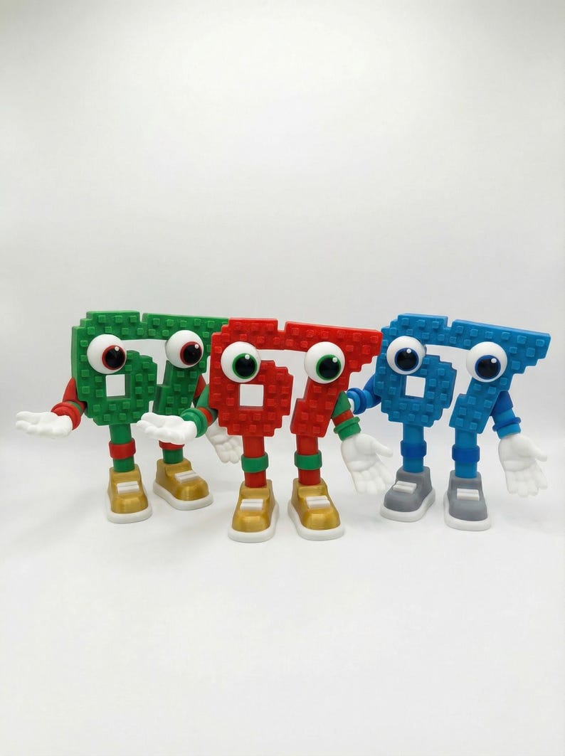 May include: Four colorful, anthropomorphic number seven figures. The figures are green, red, and blue, with white hands, large googly eyes, and gold or gray shoes. The figures are made of pixelated blocks.