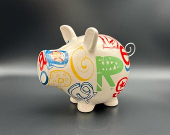 Vintage money box, large ceramic pig saving bank, piggy bank, white ceramic piglet coin bank with letters, cash box, baby pig coin bank