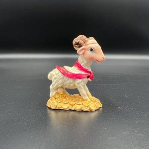 Vintage goat figurine, small plastic goat stand on money statuette souvenir, figure for goat year, white handcarved bighorn sheep statue