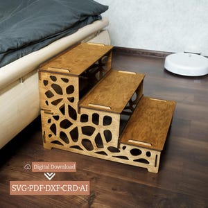 May include: A three-step wooden pet stair with a natural finish. The side panels feature a decorative cut-out design. The steps are rectangular and provide easy access for small pets. The image also includes the text "Digital Download" and "SVG·PDF·DXF·CRD·AI".