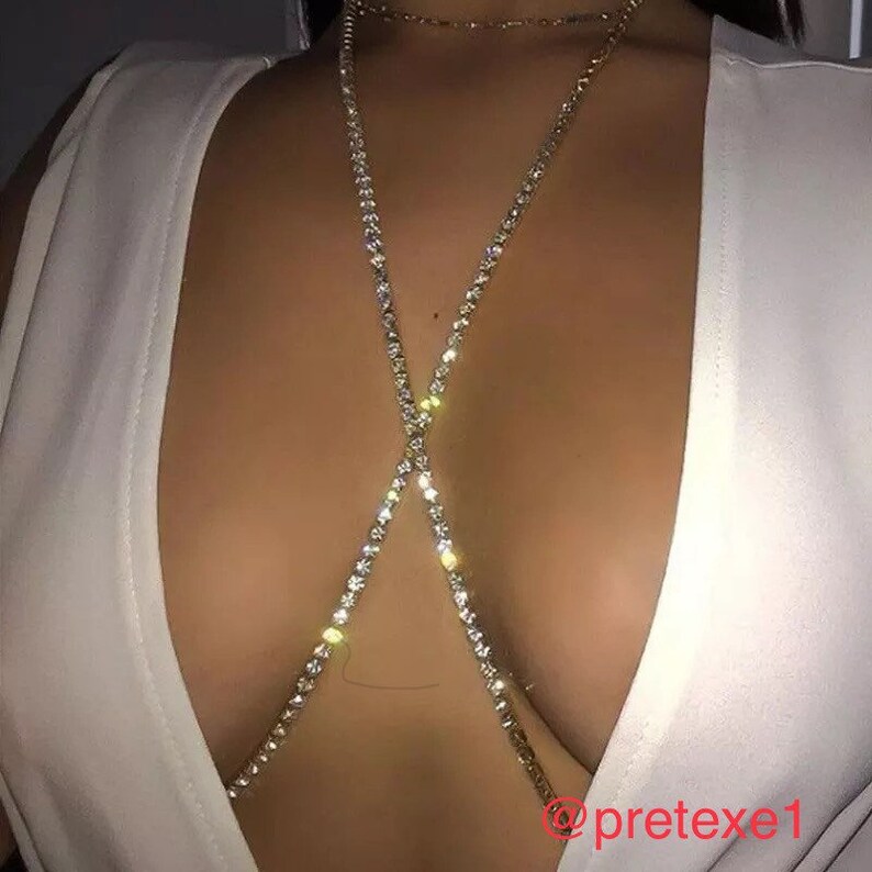 Jewelry body silver diamond chains separate that you can cross or just wear it or you desire
