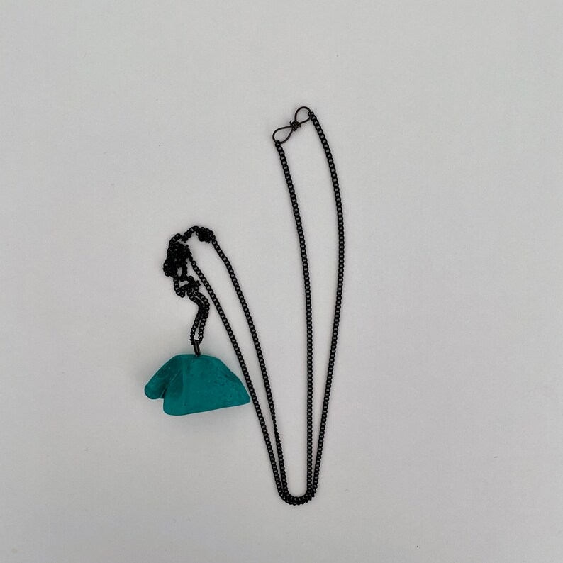 Green Lucky Charm concrete pendant necklace conceptual jewellery minimalist jewellery brutalist jewellery geometric jewellery