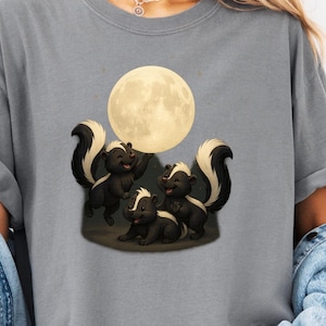 Moonlit Skunk Unisex T-Shirt, Cozy Animal Tee, Gift for Animal Lovers, Halloween Apparel, Nature Lover Top, Unique Graphic Shirt