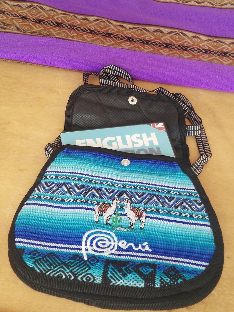 Beautiful hippie bag with ethnic designs and colours worked by artisansPeruvian art