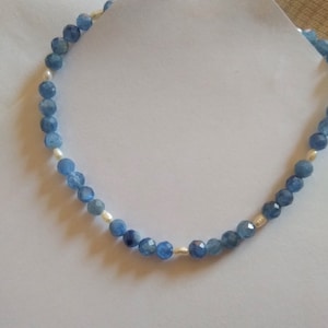 blue kyanite and freshwater pearl bracelet, sterling spring ring clasp. 8 in