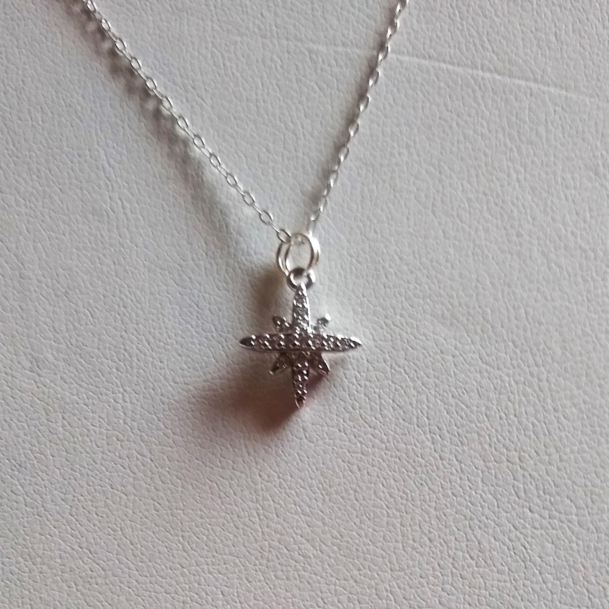 STAR JEWELRY　925 K14 CZ KIKICHIC | NYC | CZ Starburst North Star Coin Pendant