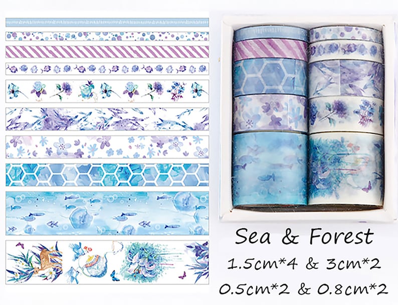 May include: A set of 10 washi tapes with blue and purple watercolor designs. The tapes feature various patterns, including flowers, fish, hexagons, and stripes. The set includes four 1.5-inch tapes, two 3-inch tapes, two 0.5-inch tapes, and two 0.8-inch tapes. The tapes are packaged in a clear plastic box with the text "Sea & Forest" printed on the front.