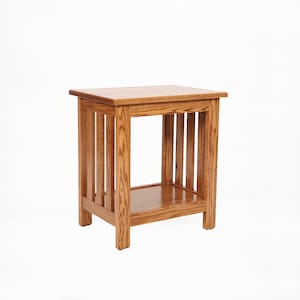 May include: A wooden side table with a square top and a lower shelf. The table is constructed with vertical slats on the sides and has a warm, natural wood finish. The table measures approximately 24 inches high.