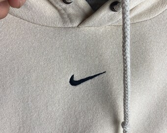 cream middle swoosh hoodie