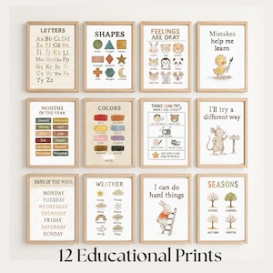 May include: A set of 12 educational wall art prints in light wood frames, featuring illustrations of letters, shapes, feelings, colours, months, days, weather, and seasons with text labels. The collection includes motivational phrases and animal characters.