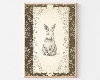 May include: A black and white illustration of a rabbit sitting on a cream background with a green and white floral border. The image is framed in a light wood frame.