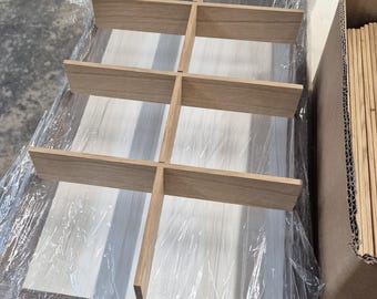 Separatore per cassetto espositivo della macchina da caffè