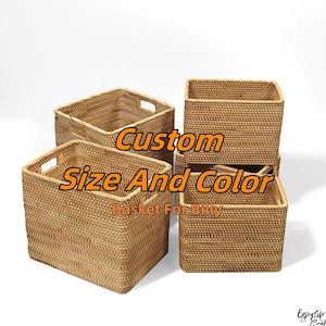 May include: Several woven rectangular baskets in a light brown color are stacked and arranged on a white background. The baskets have handles and are made of a natural material. Text on the image reads "Custom Size And Color Basket For Billy."