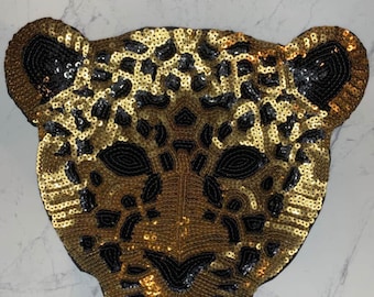 Tigre dorado y negro, guepardo y jaguar