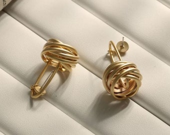 Gold plated drop earrings with wrapped around coil detail