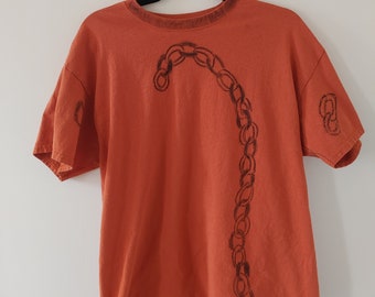 orange hand-drawn dye crayon chain t-shirt