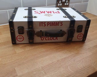 Solid  waxed chest storage suitcase style box with vegan leather covering. Secure closure.PIMMS  themed Style.