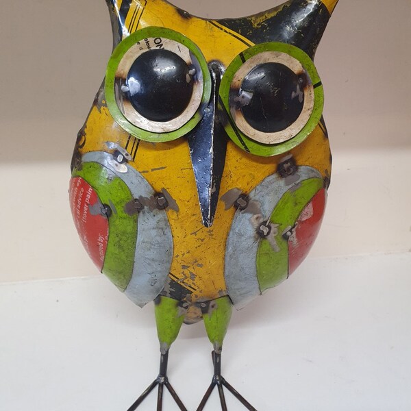 Unique handmade from recycled metal sitting owl figure. 40 X 24. A beautiful piece of home decor.