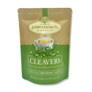 May include: A brown pouch with a green leaf design and the text "palm beach HERBALS™" in a white oval. The pouch contains 30 herbal tea bags of Cleavers Tea, which is caffeine-free, 100% natural, and sugar-free. The net weight is 1.59 oz (45g).