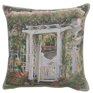 May include: A decorative throw pillow with a tapestry-style image of a white garden gate covered in green vines and flowers.