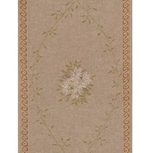 May include: A beige table runner with a floral pattern. The runner has a brown border with a repeating pattern and tassels on each end. The floral pattern is made up of white and pink flowers with green leaves.