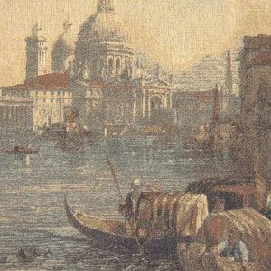 May include: A tapestry depicting a scene of Venice, Italy. The tapestry features a large building with a dome, a canal with gondolas, and a bridge. The colours are muted and the overall effect is one of peace and tranquillity.