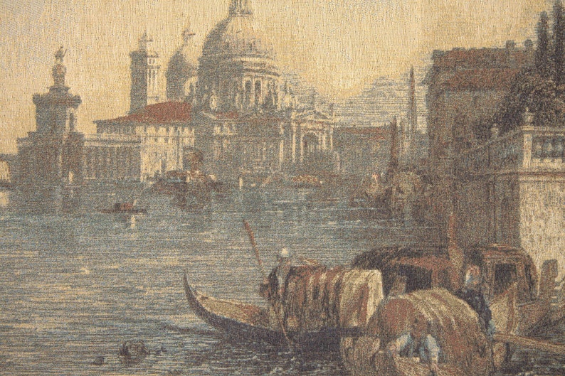 May include: A tapestry depicting a scene of Venice, Italy. The tapestry features a large building with a dome, a canal with gondolas, and a bridge. The colours are muted and the overall effect is one of peace and tranquillity.
