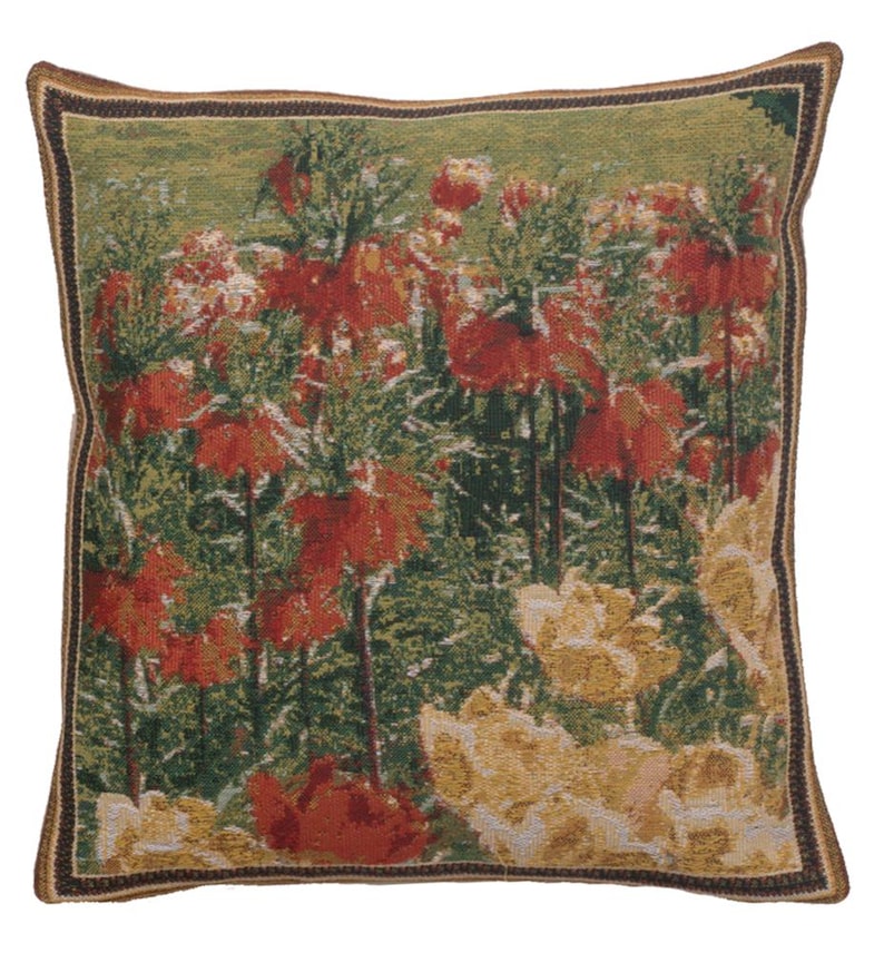 May include: A square throw pillow with a tapestry design of red and yellow flowers on a green background. The pillow has a brown border.