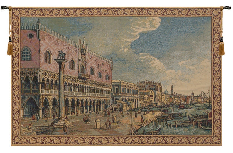 May include: Woven tapestry showing a detailed cityscape with a large pink building, a tall column, and a waterfront scene with boats. The tapestry has a decorative border and tassels.