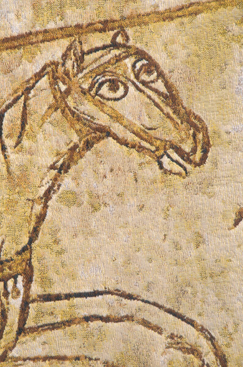 May include: A close-up of a brown and beige tapestry with a woven image of a horse's head. The horse's eye is detailed with a brown circle and a white dot.