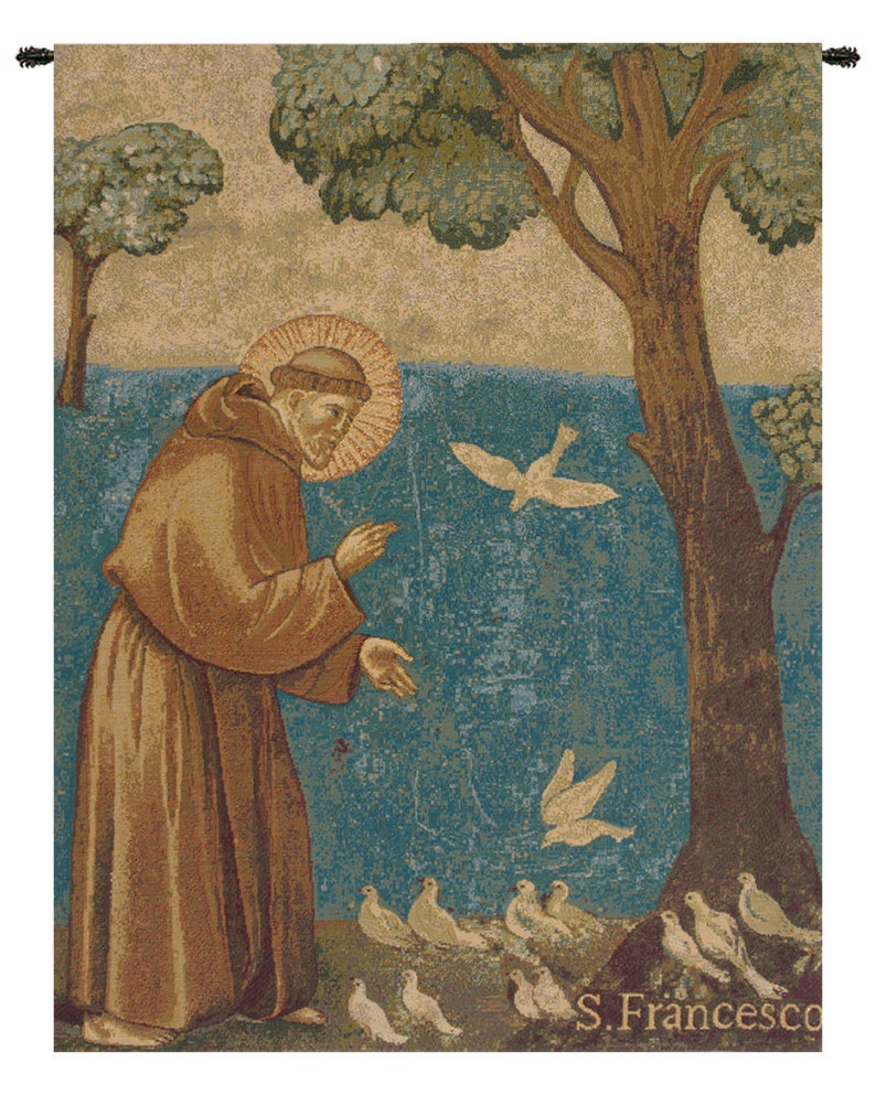 May include: A tapestry depicting Saint Francis of Assisi feeding birds. The tapestry features a brown-robed figure with a halo, standing in a landscape with trees and a blue background. The figure is feeding a flock of white doves. The tapestry is signed 'S. Francesco' in the bottom right corner.