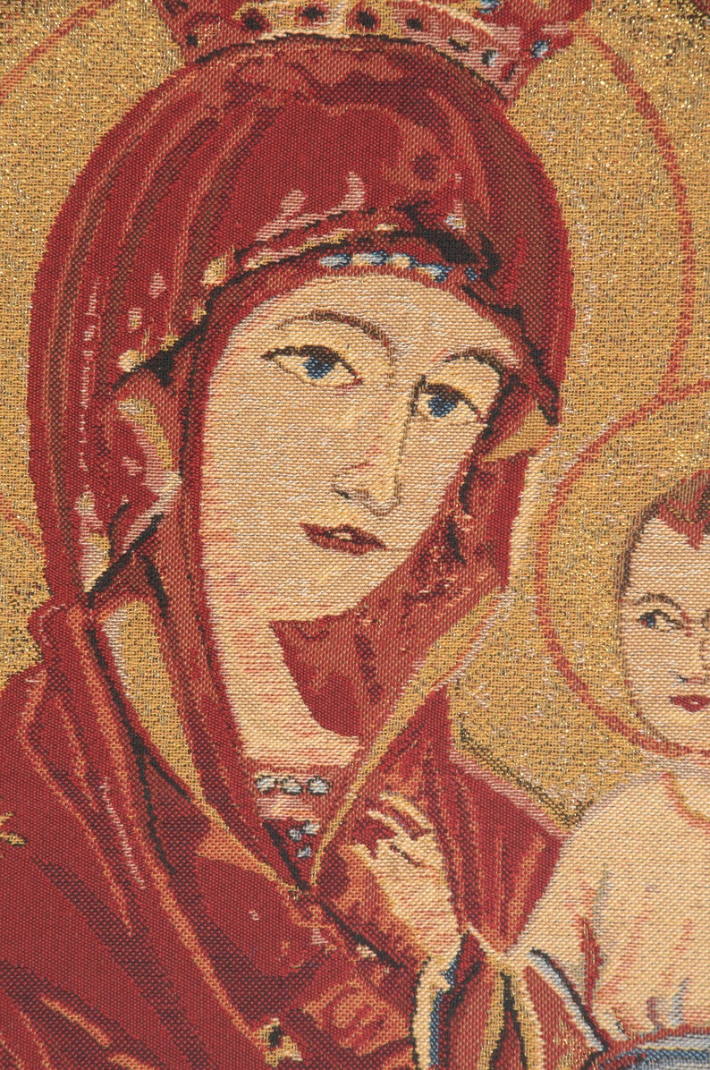 May include: A tapestry depicting the Virgin Mary with a crown and a red robe, holding a baby Jesus in her arms. The tapestry has a gold background with intricate details.