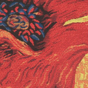 May include: Close-up of a red poppy flower with a textured woven fabric design. The flower is in focus, with the background blurred.