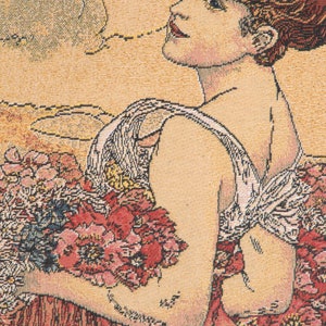 May include: A tapestry featuring a woman with red hair wearing a white dress and holding a bouquet of pink and red flowers. The background is a light beige with a floral pattern.