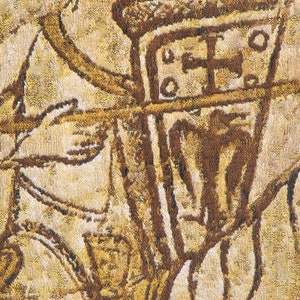 May include: Close-up of a tapestry depicting a figure in armor holding a shield with a cross. The tapestry is woven with brown and gold threads, creating a textured effect.