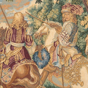 May include: A tapestry depicting two figures on horseback in a forest setting. The figures are dressed in elaborate clothing and are holding lances. The tapestry is woven with intricate details and vibrant colors.