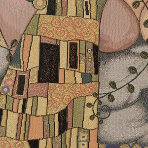 May include: A tapestry featuring a close-up of two figures embracing, with a geometric pattern in gold, black, and brown. The figures are partially obscured by the pattern, creating a sense of mystery and intimacy.