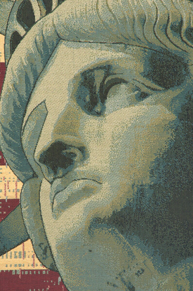 May include: Close-up of the face of the Statue of Liberty, a famous landmark in New York City. The statue is made of copper and has a green patina. The face is weathered and shows signs of age.