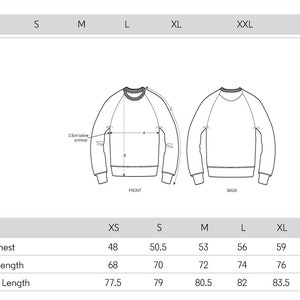 May include: Size chart for a sweatshirt with measurements in inches for half chest, body length, and sleeve length. Sizes include XS, S, M, L, XL, and XXL.