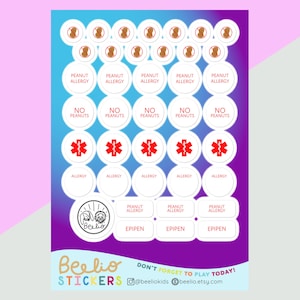 May include: A sheet of stickers with various designs and text related to peanut allergies. The stickers include images of peanuts with a red line through them, the words "PEANUT ALLERGY", "NO PEANUTS", and medical symbols. The stickers are white with red and black text.